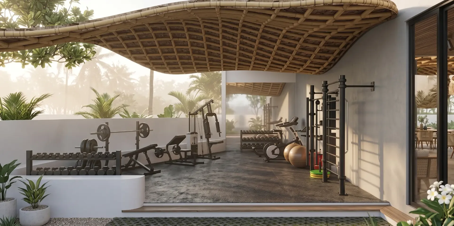 Resort K open-air gym with free weights, benches, cardio machines and a sculptural rattan canopy