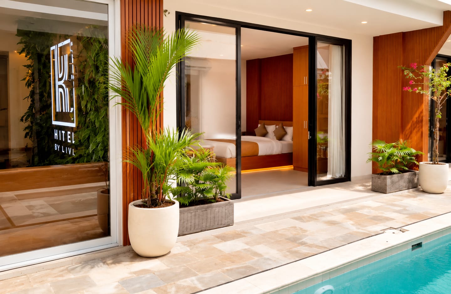 Hotel K studio apartment opening onto the pool terrace